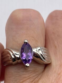 Unusual amethyst  ring Sterling setting handmade  Size 8 can be re sized for you.  My jeweler charges $20 Sterling Silver is rhodium finished to prevent tarnish All rings are shipped in a nice gift box.   Check out our over a THOUSAND great reviews Engraving is $4 per letter and is not always perfect depending on the piece. It can take a few days if the jeweler is busy. This is payable to Paypal Judithsltd@gmail.com Purple Sterling Silver Rings For Anniversary, Purple Sterling Silver Anniversary Rings, Purple Topaz Ring In Sterling Silver For Anniversary, Silver Solitaire Ring Gemstone, Hallmarked Amethyst Rings For Anniversary, Silver Marquise Birthstone Ring With Gemstone, Marquise Silver Birthstone Ring With Gemstone, Silver Hallmarked Amethyst Ring For Anniversary, Silver Amethyst Ring With Vs Clarity For Anniversary