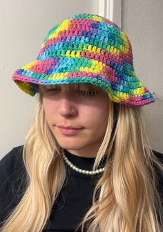 These amazing bucket hats are perfect for any outfit or occasion! They're perfect for hotter weather and blocking out the sun and they come in such fun colors! Handmade with 100% cotton yarn  *Ships 3-5 days Colorful Casual Beach Hats, Colorful Wide Brim Sun Hat For Vacation, Casual Colorful Bucket Hat, Casual Multicolor Sun Hat For Spring, Colorful Summer Vacation Sun Hat, Multicolor Bucket Sun Hat For The Beach, Colorful Spring Hats For Vacation, Colorful Adjustable Sun Hat For The Beach, Colorful Wide Brim Hat For Summer