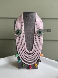 Elevate your style with our stunning Pink Layered Indian German Silver Necklace. Handcrafted with exquisite attention to detail, this piece blends traditional Indian design with modern elegance, making it the perfect statement accessory for any occasion.  Featuring intricate tanjore beads that add a touch of authentic charm, this necklace is crafted from high-quality brass, ensuring durability and a timeless appeal. Embrace the spirit of Diwali and Indian heritage with this exquisite piece that effortlessly combines ethnic allure with contemporary flair.  Add a touch of opulence to your ensemble with this gorgeous Indian jewelry, perfect for both formal and casual wear. Stand out from the crowd and indulge in the rich cultural tapestry of India with our unique, handcrafted Pink Layered Ind Bohemian Stone Work Necklaces For Festivals, Bohemian Style Stone Work Necklaces For Party, Bohemian Necklaces With Stone Work For Diwali, Bohemian Necklaces With Stone Work For Festivals, Bohemian Necklaces With Stone Work For Party, Bohemian Stone Work Necklace For Celebrations, Bohemian Chandbali Necklaces For Wedding, Bollywood Style Necklace For Diwali Party, Bohemian Bridal Necklace With Stone Work For Festive Occasions