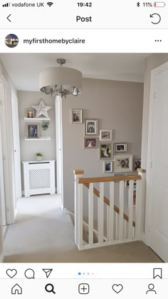 the hallway is clean and ready to be used as a place for pictures on the wall