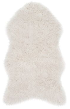 a white sheepskin rug is shown on a white background, with the top part of it