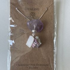 The Healing Necklace is a powerful trio of stones—Amethyst, Pink Tourmaline, and Selenite—crafted to support emotional healing, spiritual growth, and inner peace. Each stone brings its unique energies, making this necklace a beautiful and meaningful piece for anyone on a journey of healing and transformation. Amethyst: Known for its calming and spiritual properties, Amethyst is often used to enhance intuition, reduce stress, and promote inner peace. Pink Tourmaline: A stone of love and compassio Sterling Silver Crystal Necklaces For Meditation, Sterling Silver Crystal Necklace With Gemstone Beads For Meditation, Sterling Silver Gemstone Beads Necklace For Meditation, Healing Amulet Jewelry With Natural Stones, Holistic Sterling Silver Necklace With Gemstones, Holistic Healing Jewelry With Gemstones, Holistic Stones Jewelry For Meditation, Holistic Silver Necklace With Natural Stones, Holistic Mineral Crystal Jewelry With Gemstone