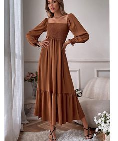 The chicest maxi dress for fall that features a square smocked bodice - which fits beautifully above bumps of all sizes. This boho vibe style with a hemmed ruffle will look gorgeous for fall photos and baby showers! Wear postpartum too. Color: Army Green, Brown Maxi length 100% Polyester Sizes: XS (0-2), S (4-6), M (8-10), L (12-14), XL (16-20) Questions? Use the chat icon to connect with a stylist. Ruffle Long Dress, Ruffled Maxi Dress, Neck Ruffle, Glamorous Evening Gowns, Flowing Maxi Dress, Dress For Women, Brunei, Ruffle Dress, Women Long Sleeve