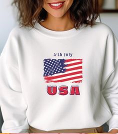 Sport Sweatshirt, Summer Sweatshirt, America Flag Sweatshirt, 4th July Sweatshirt, Independence Day, 4 th flag HOW TO ORDER 1-) Please, check and review all photos 2-) Choose your item size and color 3-) Click add to cart. You can go back to add more product 4-)Click "Proceed to check out" 5-)When you check out, you can add a note to seller for any request PRODUCT FEATURE It's a 50% Cotton /50% polyester, 13.5oz fleece. It features a double-needle collar, shoulders, and armholes. It also feature White Crew Neck Sweatshirt For 4th Of July, White Long Sleeve Tops For Independence Day, Independence Day Crew Neck Sweatshirt With Letter Print, Long Sleeve Relaxed Fit T-shirt For 4th Of July, Independence Day Letter Print Crew Neck Sweatshirt, Independence Day Cotton Letter Print Sweatshirt, Independence Day Cotton Sweatshirt With Letter Print, 4th Of July Graphic Print Crew Neck Sweatshirt, White Long Sleeve T-shirt For Independence Day