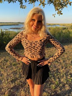 Animal Instincts Sweater | Sassy Shortcake Flirty Fitted Crop Top For Fall, Fitted Ruffle Crop Top For Fall, Fitted Ruffled Crop Top For Fall, Flirty Fitted Fall Crop Top, Fall Fitted Ruffles Crop Top, Trendy Leopard Print Crop Top For Spring, Leopard Print Long Sleeve Sweater, Winter Leopard Print Crew Neck Sweater, Pink Tiger Sweater