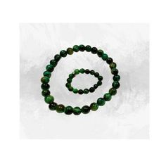 This Natural Green Tiger Eye set includes a bracelet and ring, both made with 8mm beads. The bracelet and ring are crafted from natural Green Tiger Eye, which offers a unique and stunning appearance. Experience the beauty and benefits of this one-of-a-kind set. Green Malachite Bracelets With Natural Stones, Green Malachite Bracelet With Natural Stones, Green Malachite Bracelets For Gifts, Handmade Green Malachite Bracelets, Green Malachite Beaded Bracelets As Gift, Green Malachite Beaded Bracelet As Gift, Green Malachite Round Bracelets, Adjustable Malachite Bracelets, Malachite 8mm Beads Jewelry Gift