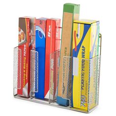 a pen holder with several different colored books and papers in it on a white background