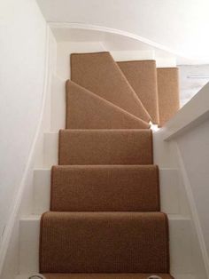 the carpeted stairs in this house are very narrow