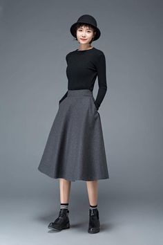 The winter skirt is made of gray wool blend and polyester, it has a polyester lining.This grey skirt has two pockets. It has some elastic in the back of waist.This wool skirt is closed by a right side zipper.I suggest dry clean for winter wool clothing, it is good for save clothing. you also can wash by your hand if you want.___________________________________SIZEAvailable in sizes XS-XXLHow to choose size ?1.Check your body measurement with instructionshttps://www.etsy.com/listing/7940540802.Ge Fall Gray Skirt With Pockets, Gray Midi Skirt For Work, Gray Full Skirt For Workwear, Gray Flared Skirt For Work, Gray Flared Workwear Skirt, Gray Full Skirt For Work, Gray Lined Skirt For Winter, Gray Knee-length Fall Skirt, Relaxed Gray Skirt For Winter