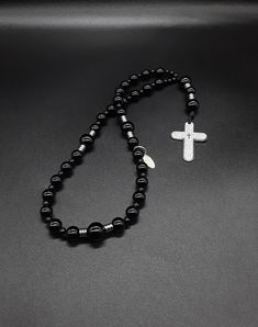 Spiritual Black Jewelry With Polished Beads, Black Gothic Jewelry With 8mm Beads, Black Beaded Cross-shaped Rosary, Black Beaded Cross Rosary, Black Obsidian 8mm Bead Jewelry, Black Cross Jewelry With 8mm Beads, Black Hematite Spiritual Jewelry, Black Spiritual Cross Jewelry, Spiritual Black Cross Jewelry