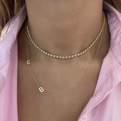 Make a statement with this Custom Gold Initial Necklace! The perfect gift for yourself or a loved one, this gorgeous piece is designed with one or multiple initials, adding the perfect amount of personalization. This piece makes the perfect gift for a new bride or a new mother. This item is FINAL SALE from date of purchase. Metal: 14k White Gold / 14k Yellow Gold / 14k Rose Gold 1.1mm Cable Chain Length: 18 inches at the longest with jump rings at 16" & 17" Closure: Lobster Clasp Initial size: A Gold Initial Necklace, New Bride, Collar Chain, Mens Engagement, Initial Necklace Gold, Birthstone Gifts, Tennis Necklace, Bridal Bands, Band Bracelet