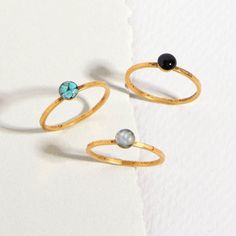 The Tiny Round Gemstone Stacking Ring are sold individually and shown here in turquoise, specularite (black), and mother of pearl.  Can be made with any crushed gemstone of your choice.  Gold plated over pewter with a slightly hammered look.  Sizes 6 and 7 available. Stackable Rings Gold, Gemstone Stacking Ring, Gold Rings Stackable, Surgical Steel Earrings, Rings Gold, Cat Earrings, Stacking Ring, Stacking Rings, Stackable Rings