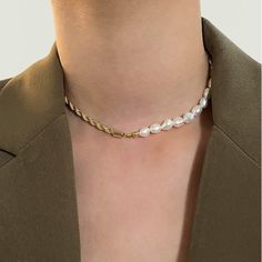 The Pearl Chain Necklace blends the classic beauty of pearls with the modern appeal of an 18k gold-plated chain, creating a piece of refined elegance that's perfect for both contemporary and traditional styles. Pearl White Pearl Necklace With Chain, Classic Gold-plated Pearl Chain Necklace, Classic Gold Pearl Necklace With Chain, Elegant Gold Pearl Necklace With Chain, Chic White Chain Necklace With Pearl Charm, Pearl White Pearl Clavicle Chain Necklace, Trendy White Chain Necklace With Pearl Pendant, White Pearl Necklace With Gold Chain, Gold Pearl Necklace With Baroque Pearls