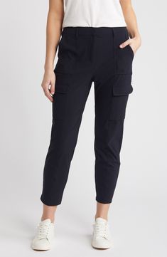 Soft and ultrastretchy fabric means all-day comfort in these relaxed-fit cargo pants boasting a breezy cropped fit and a plethora of handy pockets. 26" inseam; 13" leg opening;10 3/4" front rise; 15" back rise (size Medium) Zip fly with hook-and-bar closure Front slant pockets; cargo flap-patch pockets 68% nylon, 32% elastane Machine wash, line dry Imported Athleisure Ankle-length Cargo Pants With Side Pockets, Athleisure Straight Leg Cargo Pants For Workwear, Sporty Tapered Leg Cargo Pants For Work, 4-way Stretch Athleisure Cargo Pants, Functional Cargo Pants With Cargo Pockets For Work, Functional Cargo Pants With Multiple Pockets For Work, Sporty Cargo Pants With Multiple Pockets For Work, 4-way Stretch Straight Leg Cargo Pants For Work, Athleisure Cargo Pants For Workwear With Hip Pockets