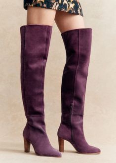 High-heeled thigh high boots;Made in our Portuguese atelier;Interior zip fastening system;Split leather exterior;Leather lining and insole;Leather and rubber outsole;Leather laminated heel;Heel height: 8 cm / 3.1 in;Tone-on-tone metal zip Atelier Interior, Purple Boots, Top Clothing, 2025 Fashion, Rubber Heels, Thigh High Boots, Parisian Style, Thigh High, Thigh Highs