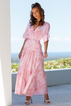 Length from shoulder to hem of size S: 141cm. Pink maxi dress. Non-lined. Cold hand wash only. Model is a standard XS and is wearing size XS. True to size. Lightweight, non-stretchy woven farbic. Shirred, stretchy waist. No zipper. Print placement may vary. Rayon. Be the blooming rose in someone else's bouquet this weekend wearing our Savage Love Maxi Dress! Billowy and perfect for warm-weather, we're low key obsessed with its feminine cinched waist, vintage floral print, and tiered ruffle skirt Maxi Dress Outfit Fall, Savage Love, Tiered Ruffle Skirt, Pink Maxi, Blooming Rose, Pregnancy Maxi Dress, Vintage Floral Print, Pink Maxi Dress, Weekend Wear