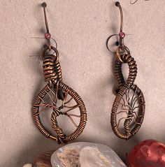 Aged copper tree of life earrings Copper Dangle Jewelry As Gift, Copper Dangle Jewelry For Gift, Nature-inspired Copper Dangle Earrings, Nickel-free Artisan Copper Jewelry, Artisan Nickel-free Copper Jewelry, Nickel-free Bronze Copper Jewelry, Bronze Nickel-free Copper Jewelry, Bohemian Tree Of Life Round Jewelry, Bohemian Rose Gold Jewelry With Ear Wire