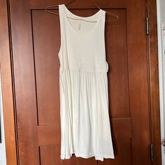 Bellamie White Tank Dress With Pockets, Size Large, Never Worn, 95% Rayon, 5% Spandex. Casual Cream Sleeveless Dress, Off White Sleeveless Cotton Mini Dress, Casual Off-white Daywear Dresses, Casual Off White Dresses For Daywear, Casual Off White Daywear Dress, Cream Sleeveless Mini Dress For Daytime, Casual Sleeveless Cream Mini Dress, Casual Cream Sleeveless Mini Dress, Casual Off White Cotton Mini Dress