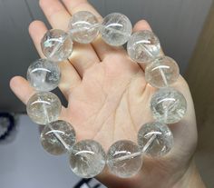 Material:Rock Quartz beads size :Approx 19mm   quantity: one strand  6mm approx 29 pcs one strands 7mm approx25 pcs one strands 8mm approx 22 pcs one strands 9mm approx 21pcs one strands 10mm approx 19 pcs one strands 11mm approx 18pcs one strands 12mm approx 16 pcs one strands 13mm approx 16 pcs one strands 14mm approx 15 pcs one strands 15mm approx 14pcs one strands 16mm approx 14 pcs one strands 17mm approx 13pcs one strands 18mm approx 13pcs one strands 19mm approx 12pcs one strands 20mm app Healing Crystal Bracelet With Spacer Beads, Handmade Clear Bracelets, Gift Polished Round Beads, Clear Crystal Bracelet With 8mm Round Beads, Clear Crystal Bracelet With 8mm Beads, Handmade Clear Beaded Round Bracelets, Large Beads Stretch Bracelet As Gift, Large Beads Stretch Bracelet Gift, Healing Bracelets With Large Beads