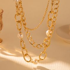 Material: Imitation pearl Color: Gold Fashion Element: Chain Style: Europe and America Party Pearl Necklace With Alloy Chain, Trendy Gold Pearl Necklace With Chain, Party Alloy Pearl Chain Necklace, Party Pearl Chain Necklace In Alloy, Trendy Pearl Necklace With Chain, Trendy Metal Pearl Necklace With Pendant, Chic Pearl Chain Necklace With Adjustable Chain, Long Pearl Necklace With Chain, Pearl Chain Necklace For Party