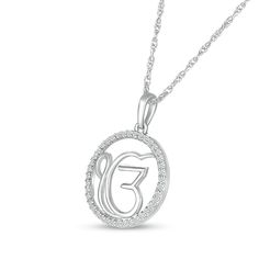 The Sikh symbol for the mantra of oneness becomes a sparkling style in this diamond Ik Onkar circle pendant. Crafted in sterling silver A polished Ik Onkar symbol shines inside a diamond-lined circle border. This 1/6 ct. t.w. diamond pendant suspends along an 18.0-inch rope chain that secures with a spring-ring clasp. Symbolic Diamond Accents Pendant Jewelry, Symbolic Pendant Jewelry With Diamond Accents, Symbolic Diamond Jewelry With Gemstones, Symbolic Diamond Pendant Jewelry, Spiritual Diamond Round Pendant Jewelry, Spiritual Silver Diamond Necklace, Spiritual Round Pendant Necklace In Cubic Zirconia, Spiritual Cubic Zirconia Round Pendant Jewelry, Symbolic Diamond Jewelry With Polished Finish