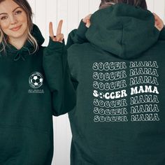 Stay cozy on the sidelines with our Custom Soccer Mama Sweatshirt! This stylish Sports Mom Sweater is perfect for game days and beyond. Personalize it with your player's name to create a unique Custom Name Soccer Sweater that celebrates your Soccer Mom Life. It's a thoughtful Gift Shirt for Sports Moms who love supporting their athletes. Whether it's a chilly game day or just everyday wear, this Game Day Hoodie is a must-have for every proud soccer mom! Hi all, welcome to the Comfy Tee Design, It's so nice to see you here. If you are looking for soft, comfy and high quality sweatshirts, I have good news for you: You're at the right place!  Sweatshirts are unisex sizing. It's proper, comfortable and flattering for men and women, but may run  large for the ladies. Please see the size chart t Sporty Fleece Hoodie With Letter Print, Sporty Crew Neck Hoodie For Team Events, Sporty Athletic Heather Hoodie For Sports, Sports Tops In Team Colors Made Of Fleece, Sporty Hoodie With Logo Print For Sports Season, Varsity Crew Neck Sports Hoodie, Team-colored Sweatshirt For Sports, Team-colored Sports Sweatshirt, Fall Sports Event Hoodie With Logo Print