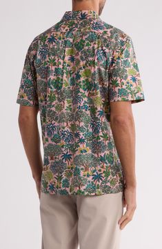 An artistic tropical trees print brings resort-ready appeal to a short-sleeve button-up shirt constructed from soft, breathable cotton. 29" length Front button closure Point collar Short sleeves Chest patch pocket 100% cotton Machine wash, tumble dry Made in the USA of imported fabric Pink Palm Tree Print Short Sleeve Top, Cotton Camp Shirt With All Over Print, Pink Cotton Top With Palm Tree Print, Spring Short Sleeve Hawaiian Shirt With Palm Tree Print, Tropical Relaxed Fit Camp Shirt With All Over Print, Cotton Hawaiian Shirt With All Over Print, Vacation Short Sleeve Shirt With All Over Print, Vacation Printed Relaxed Fit Short Sleeve Shirt, Spring Palm Tree Print Short Sleeve Hawaiian Shirt