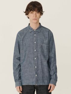 The Curtis shirt from YMC is part of their Earth collection. A timeless staple, sustainably constructed in a pure organic cotton chambray. A relaxed fit, finished with corozo buttons. Made in Portugal by YMC’s ethically certified production partner. - 100% Organic cotton - Relaxed fit long sleeve shirt - Garment washed organic chambray - Twin needle topstitch seams - Self-fabric chest pocket with loop - Corozo button fastening and cuffs - Made in Portugal