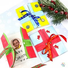 christmas presents are wrapped in colorful paper and tied with ribbon