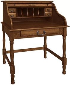 an old fashioned wooden desk with drawers