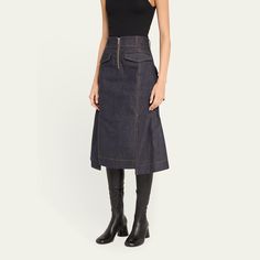 SACAI flared denim midi skirt features multiple pocket details  High rise  Zipper fly  Hem falls below the knee A-line silhouette  Skirt falls straight from hip to hem Cotton Dry clean Made in Japan Flared Denim Skirt, Midi Skirt With Pockets, Flared Denim, High Rise Skirt, Denim Midi Skirt, Fall Skirts, Denim Flares, Skirts With Pockets, Pocket Detail