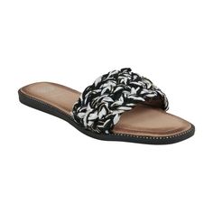 Add a touch of flair to your summer outfits with the Arly sandal by GC Shoes. Its timeless design is enhanced by intricate woven details, adding texture and visual interest. With a padded footbed, these sandals guarantee utmost comfort as you take each step in style. Perfect for warm weather ensembles. Black Woven Sandals For Spring, Casual Black Woven Sandals, Textile Sandals With Textured Sole For Beach, Flat Textile Sandals For Vacation, Flat Woven Synthetic Sandals, Black Slides With Woven Sole For Summer, Flat Textile Sandals With Woven Sole, Beach Black Sandals With Woven Detail, Woven Synthetic Slip-on Sandals