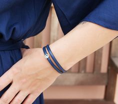 "This handmade double wrap cobalt blue leather bracelet is made of genuine leather and silver plated Swarovski bead. It has a super safe hypoallergenic magnetic clasp. Very comfortable & easy to wear. Looks great with t-shirt, jeans or boho dress! ✧ 100% Handcrafted ✧ Absolutely Unique ✧ Hypoallergenic ✧ High Quality Genuine Leather Inlay ✧ Gift-ready in a cute craft box ❤ Ready to ship in 1-2 business days ❤ Average shipping time (US/Canada/UK) 5-10 business days ❤ Tracking Available BeGenu Elegant Blue Wrap Bracelet As Gift, Elegant Blue Wrap Bracelet As A Gift, Elegant Blue Leather Bracelet For Gift, Elegant Blue Adjustable Leather Bracelet, Elegant Adjustable Blue Leather Bracelet, Jewelry For Couples, Bracelets Braided, Leather Inlay, Bracelets Boho