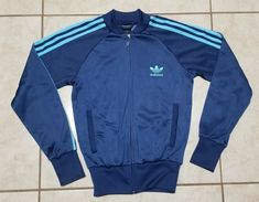 Adidas Original Womens Athletic Track Jacket Blue Size XS. Gym, Running, Sports. Good Pre-owned Condition. No Stains! Feel Free To Ask  Any Questions.  Shipped with USPS Priority Mail. Adidas Blue Track Jacket For Streetwear, Blue Three Stripes Track Jacket For Fall, Blue Stripe Outerwear For Streetwear, Blue Streetwear Outerwear With Three Stripes, Adidas Blue Track Jacket With Three Stripes, Adidas Blue Outerwear With Three Stripes, Adidas Blue Outerwear With Three Stripes Branding, Fitted Blue Track Jacket For Streetwear, Blue Hooded Outerwear With Three Stripes