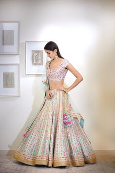 This set features a gota and thread embroidered multi-color lehenga set. Color: Blue Fabric: Silk; Viscose Embroidery Details: Gota And Thread Care: Dry Clean Only Eid Floor-length Multicolor Embroidered Sets, Floor-length Multicolor Embroidered Sets For Eid, Floor-length Floral Embroidery Set For Festivals, Fitted Multicolor Palazzo Set With Zari Work, Multicolor Floral Embroidered Palazzo Set For Wedding, Designer Floor-length Sets With Multicolor Embroidery, Floor-length Multicolor Embroidered Designer Sets, Bollywood Style Pista Green Sets With Floral Embroidery, Anarkali Fitted Set With Multicolor Embroidery