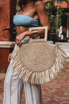 We can't get enough of a big summer beach bag!! This oversized fringe detail bag is a great beach bag for any vacation. It's size is perfect to include your summer essentials.Zipper closure. No crossbody or chain attachment. Available in 3 colors; ivory, tan & red. Trendy Beach Straw Bag With Tassels, Summer Vacation Straw Bag With Tassels, Summer Vacation Tassel Straw Bag, Trendy Natural Bag With Fringe, Trendy Summer Beach Bag With Tassels, Trendy Beach Bag With Tassels, Trendy Beach Bag With Fringe, Trendy Beach Bags With Fringe, Trendy Beach Bags With Tassels