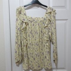 Chaps Long Sleeved Blouse, Ladies Size Medium, Yellow With Purple And Green Floral Print. 27" Long, 27" Bust, 24" Length Sleeves With Elastic At Wrists. Pretty Ruffles At Shoulders And Square Neckline. 85% Cotton 45% Viscose. Never Worn, Tags Still Intact. Smoke Free Home. Red And Black Shirt, Sheer Long Sleeve Top, Women Floral Blouse, Green Floral Print, Silky Blouse, Purple And Green, Polka Dot Blouse, Red Shirt, Boho Blouses