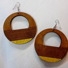 These Are Unique And Natural Medium Hoop Design Natural Wood They Hang 2 Inches Not Too Big These Are Very Lightweight On The Ear Easy To Wear They Are One Of A Kind These Earrings Are A Classic And Natural Addition To Any Wardrobe Trendy Small Hoop Yellow Earrings, Handmade Small Hoop Yellow Earrings, Handmade Adjustable Yellow Hoop Earrings, Handmade Yellow Small Hoop Earrings, Yellow Hoop Earrings For Pierced Ears, Handmade Yellow Circle Earrings, Yellow Small Hoop Earrings As Gift, Yellow Small Hoop Earrings For Gift, Yellow Hoop Earrings For Everyday