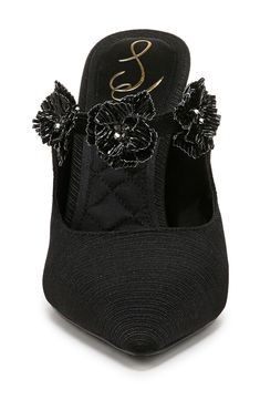 A towering heel gives unexpected height to a mule that's fronted with a pointy toe and topped with beaded flower appliqués. 4" heel Textile upper and lining/rubber sole Imported Elegant Embellished Open Toe Mules, Chic Embellished Evening Mules, Glamorous 4-inch Heel Mules For Evening, Elegant High Heel Mules For Gala, Glamorous Evening Mules For Spring, Spring Evening Embellished Mules, Floral Embellished Open Toe Heels For Evening, Spring Embellished Elegant Heels, Elegant Embellished Heels For Spring