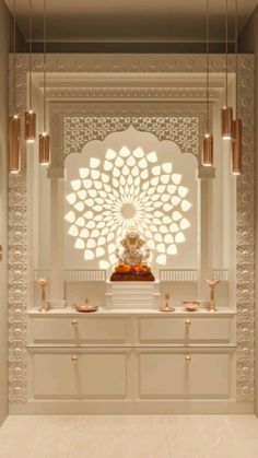 a white and gold room with an intricately designed wall hanging above the counter area