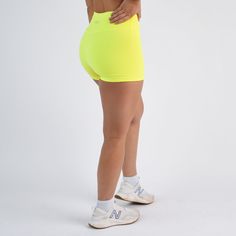 The no front seam short of your dreams. Ascend is for the athlete looking for a smooth front short with maximal leg freedom. These shorts have a 3.25” inseam, traditional side seams, and a high rise. Elevate your next training session in this distraction-free style. Neon Yellow: a solid you can get behind. The perfect shade for hot, sunny days, and strong legs. This vivid shade has brightness for days! High rise (same as Charge NFS) 3.25” inseam Double Lined in White No front seam Triangle gusset Designed for training & leg freedom Kate is 5'5" and wearing size S Biker Shorts With Built-in Shorts For Training, Athletic Fit Activewear With Built-in Shorts, Athletic Fit Bottoms With Built-in Shorts, Training Activewear With Built-in Shorts, Sporty Bottoms With Built-in Shorts And Athletic Fit, Mid-thigh Athletic Shorts With Built-in Shorts For Training, Workout Athletic Shorts With Built-in Liner, Sporty Stretch Athletic Shorts With 5-inch Inseam, Sporty Running Bottoms With Built-in Shorts