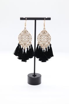 This is a pair of gold filigree earrings with black tassels. They are very pretty and would be a great addition to any jewelry collection. Earrings Diy Handmade, Gold Filigree Earrings, Filigree Earrings, Earrings Diy, Gold Filigree, Holiday Jewelry, Wedding Weekend, Feather Earrings, Diy Earrings