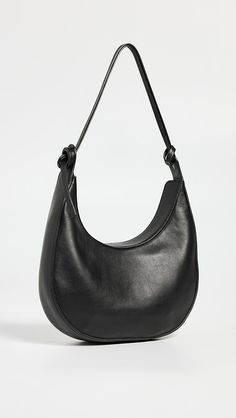 Reformation Medium Rosetta Shoulder Bag | Shopbop Chic Leather Shoulder Bag With Round Handle, Leather Bags With Adjustable Strap And Round Handle, Elegant Leather Shoulder Bag With Arcuate Strap, Leather Hobo Bag With Adjustable Strap And Round Handle, Leather Shoulder Bag With Arcuate Strap For Travel, Ugg Tasman Outfit, Ugg Tasman Slippers Outfit, Slipper Outfit, Slippers Outfit