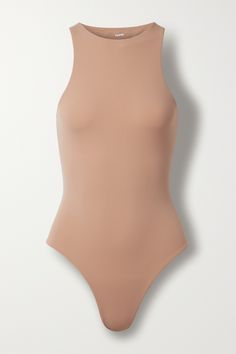 SKIMS' 'Fits Everybody' bodysuit has earned cult status thanks to the way it hugs and sculpts the figure. It's made from double-layered stretch satin-jersey and has a seamless thong back which appears invisible under clothing. Fitted High Cut Bodysuit With Boning, Fitted Bodysuit With Boning, Fitted High-cut Bodysuit With Boning, Fitted High Cut Lined Bodysuit, Fitted High Cut Smoothing Bodysuit, Smoothing Fitted High Cut Bodysuit, Smoothing Fitted High-cut Bodysuit, Seamless Fitted Backless Bodysuit, Fitted Smoothing Backless Bodysuit