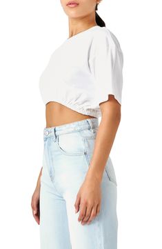 Top your high-waist styles with this staple cropped T-shirt crafted from pure cotton with a stretch elastic hem. Crewneck Short sleeves Lined 100% cotton with 93% polyester, 7% spandex contrast Hand wash, dry flat Imported Cotton Cropped Hem T-shirt For Summer, Spring Cotton Crop Top With Elastic Waistband, White Relaxed Fit Crop Top With Cropped Hem, White Relaxed Fit Crop Top, White Stretch Cropped Shirt, White Cotton Crop Top With Cropped Hem, White Cropped T-shirt For Spring, Trendy Cotton Tops With Elastic Waistband, White Crop Top With Short Sleeves