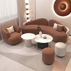 a living room filled with brown and white furniture