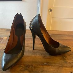 Size 39, Never Worn. Heel Is 5". Studded Fitted Heels For Formal Occasions, Formal Studded Fitted Heels, Formal Fitted Studded Heels, Studded Pointed Toe Heels For Night Out, Edgy Leather Heels With Sculpted Heel, Edgy Leather Heels With Spikes, Edgy Leather Spiked Heels, Edgy Studded Evening Heels, Edgy Studded Heels For Evening