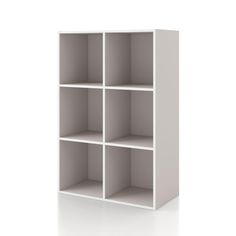 a white bookcase with four shelves on each side