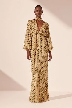 Plunged balloon sleeve maxi dress in a light weight semi-sheer chiffon in the exclusive Axel geometric print. V-neck Maxi Dress With Blouson Sleeves For Spring, Spring V-neck Maxi Dress With Blouson Sleeves, Fall Evening Maxi Dress With Gathered Sleeves, Evening Maxi Dress With Elastic Sleeves For Fall, Chic V-neck Maxi Dress With Draped Sleeves, Glamorous Chiffon Maxi Dress For Summer, Fall Evening Maxi Dress With Elastic Sleeves, Spring Party Maxi Dress With Gathered Sleeves, Formal Maxi Dress With Gathered Sleeves