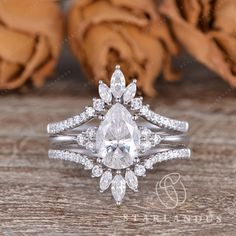 an engagement ring set with a pear shaped diamond